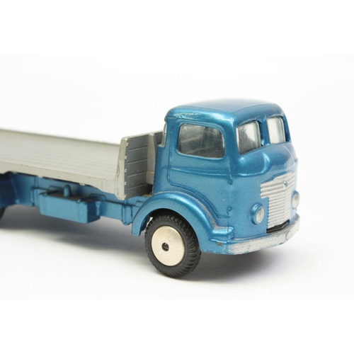 123 - Corgi Toys 454 Commer Platform lorry, metallic blue cab, silver/grey platform, flat hubs, boxed (blu... 