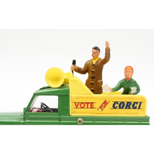 132 - Corgi Toys 472 Land Rover 'VOTE FOR CORGI', green body, red and yellow interior, two plastic figures... 