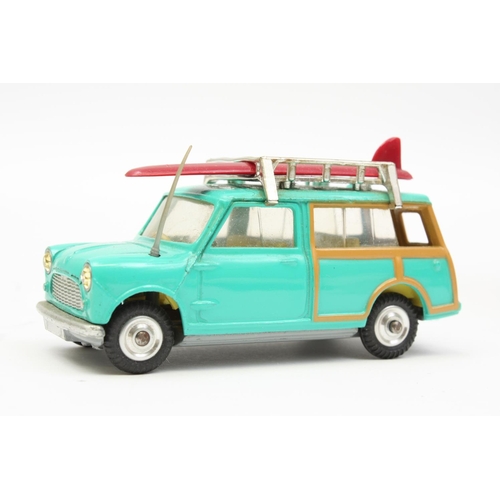 140 - Corgi Toys 485 B.M.C. Mini Countryman, sea green body, lemon yellow interior, two dark red surfboard... 