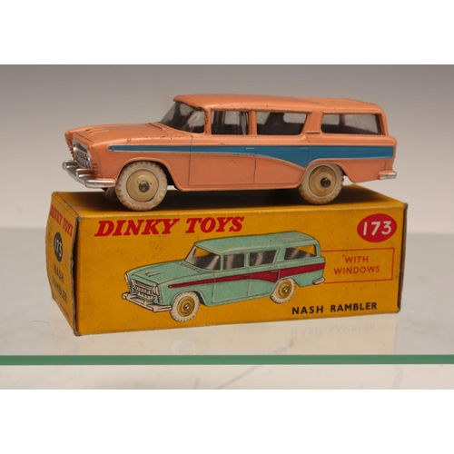 251 - Dinky Toys 173 Nash Rambler with windows, light pink body, blue flash stripe to sides, cream hubs, w... 