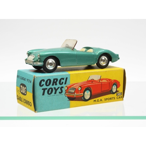 70 - Corgi Toys 302 M.G.A Sports car, metallic green body, green and cream interior, windscreen intact, b... 