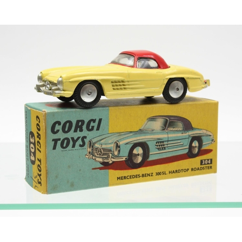 73 - Corgi Toys 304  Mercedes Benz 300 SL Hardtop, yellow body, red roof, spun hubs, boxed (yellow and bl... 