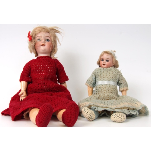 309 - An Armand & Marseille bisque head and composition ball jointed body doll, sleeping blue glass eyes, ... 