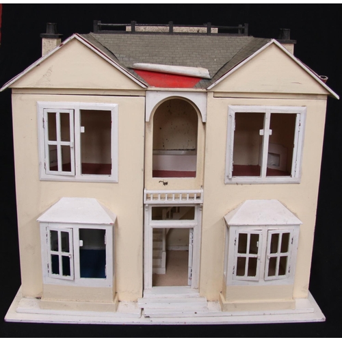 313 - A large wooden hand painted cream dolls house, red roof, the interior comprising of a Living room, K... 