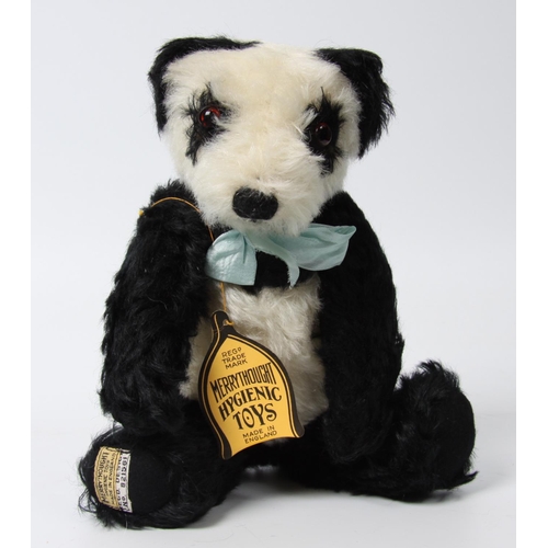 318 - A Merrythought black and white mohair Panda, amber and black plastic eyes, vertically black stitched... 