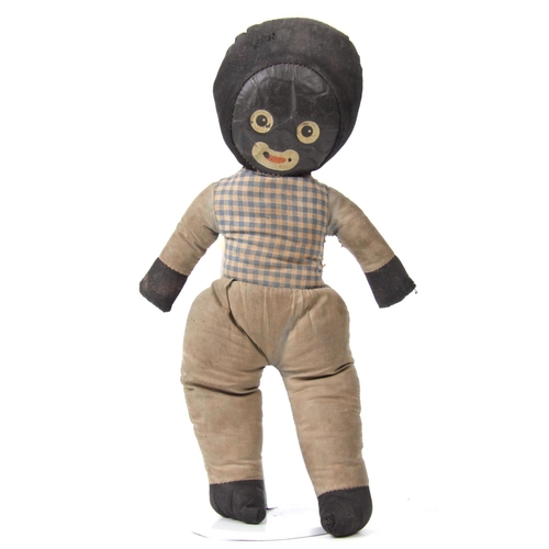 323 - A cloth filled Golly, leather type face with printed features, unknown maker 30cm tall