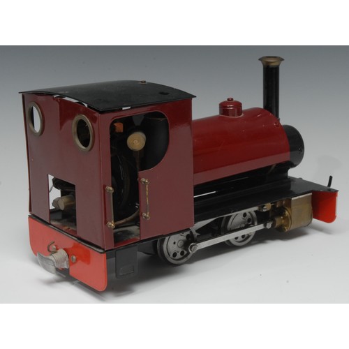 2075 - A 20th century O Gauge 0-4-0 tank locomotive, live steam, maroon livery, 27cm long, serial number Bo... 