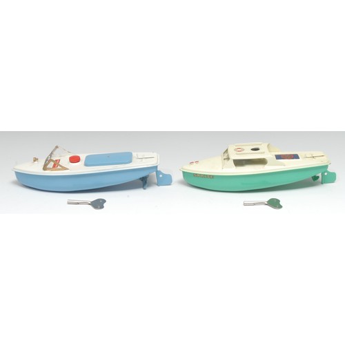 2084 - A Sutcliffe Model tinplate and clockwork No.121 speedboat ‘Tiger’, pale blue hull with white deck, p... 