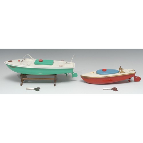 2085 - A Sutcliffe Model tinplate and clockwork speedboat ‘Racer 1’, red hull with cream deck, red rudder a... 