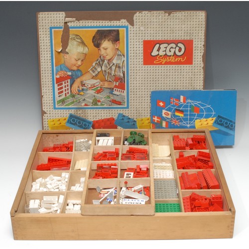 2098 - A 1960’s Lego System set, comprising a quantity of No.218 2x4 red bricks, No.219 2x3 red bricks, No.... 