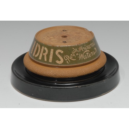 2172 - Advertising - a glazed stoneware shop counter top bell stand, Idris Royal Mineral Waters, circular b... 