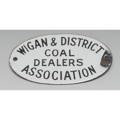 2244 - Advertising – a Wigan & District coal dealers association oval shaped enamel plaque, 15cm wide