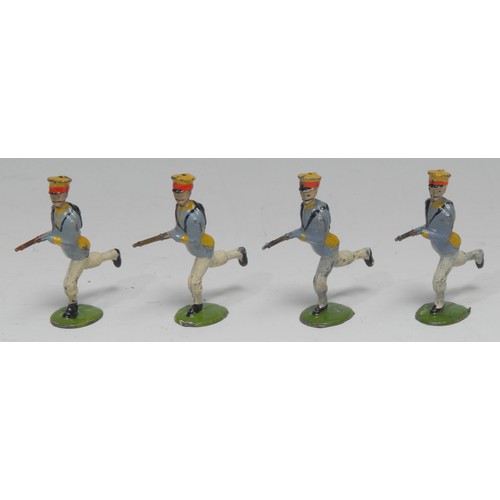 2379 - W Britain (Britains) from set No.134, comprising of four lead charging Japanese infantry figures, ea... 