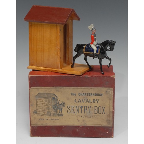 2403 - C.E.T. & Co Charterhouse Cavalry Sentry box set, comprising of painted and varnished wooden sentry b... 