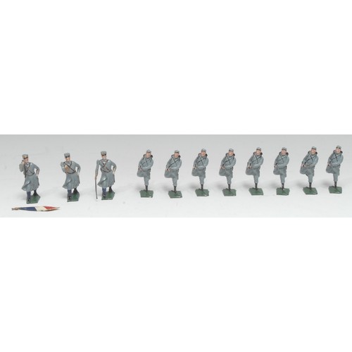 2407 - A group of French lead French Foreign Legion figures, various poses, some at the charge, each on a r... 