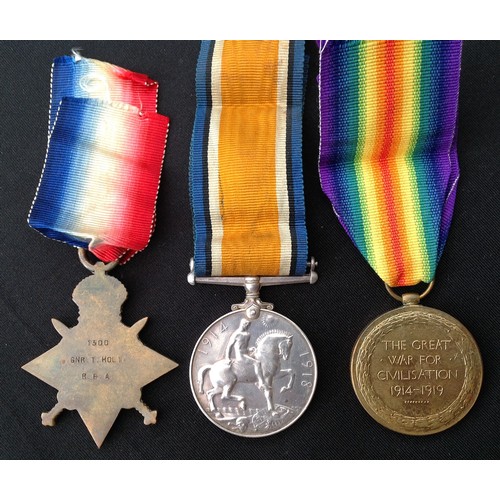 10 - WW1 British 1914-15 Star, War Medal and Victory Medal to 1300 Gnr T Holt, RFA. Complete with ribbons... 