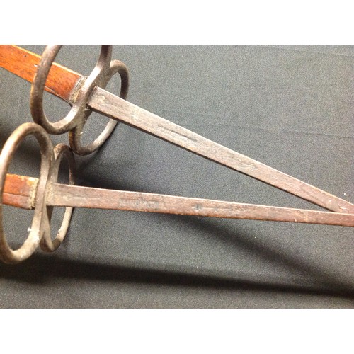 63 - A pair of German made Fencing Foils. Both with 87cm long blades, maker marked 