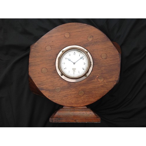 70 - A WW1 British Trench Art Clock comprising of an wooden WW1 aircraft propeller boss with eight stud h... 