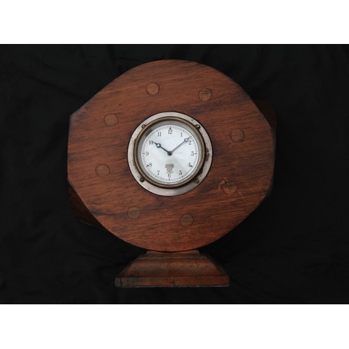 70 - A WW1 British Trench Art Clock comprising of an wooden WW1 aircraft propeller boss with eight stud h... 