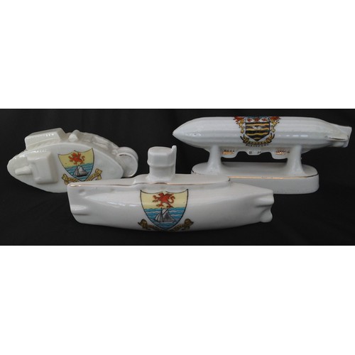 81 - WW1 British Crested China: Tank with Rhyl crest 11cm in length along with a Submarine with Rhyl cres... 