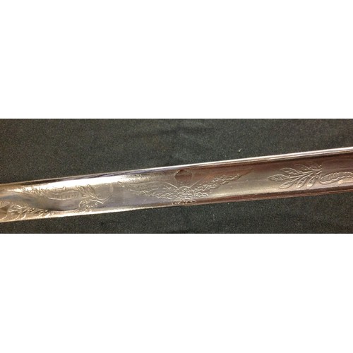 89 - REPRODUCTION WW2 RAF Officers Sword with fullered single edged 825mm long blade with etched decorati... 