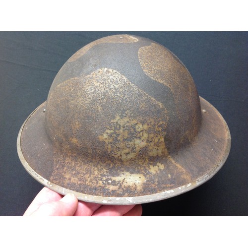 119 - WW2 British Steel Helmet with original camouflage paint. Shell only, no liner or chinstrap. The camo... 