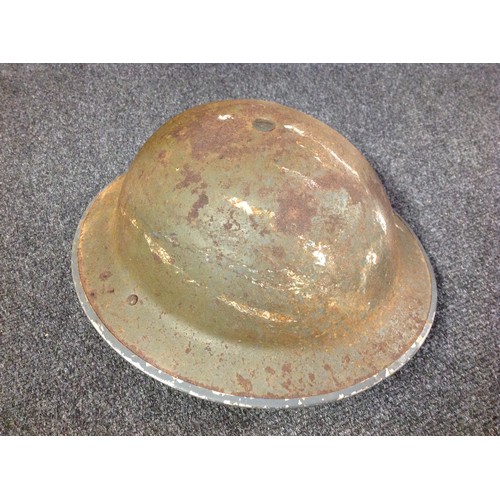 122 - WW2 British Home Front Steel Helmet, original grey paint, three holes to rim to show not suitable fo... 