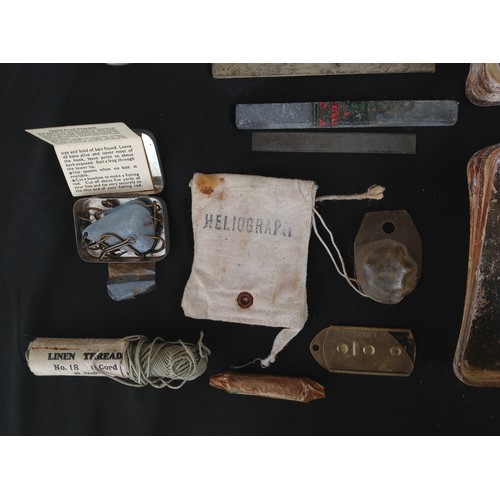 373 - WW2 British RAF Aircrew Survival Kit: two plastic boxes in relic condition, rabbit snare, fire light... 