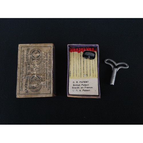 392 - WW2 British SOE Matchbox Incendiary Devise. A Matchbox which contains a clockwork mechanism which ac... 