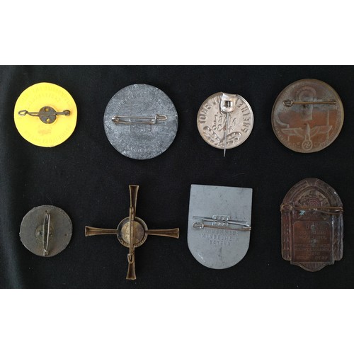 420 - WW2 Third Reich Rally & WHW Badge collection of eight different badges to include Tag Der Arbeit 193... 