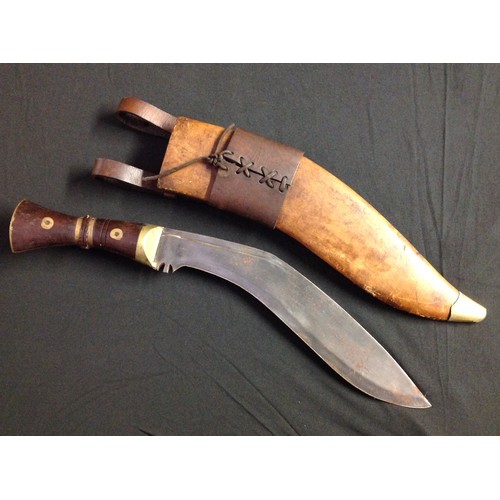 437 - REPRODUCTION WW1 British Kukri knife. Single edged fullered blade 34cm in length. Marked 1917 with i... 