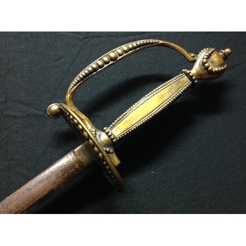 440 - Dress Sword with 77.5cm long double edged blade with etched decoration.  No makers mark. Brass guard... 