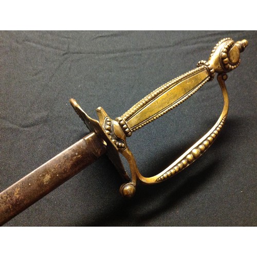 440 - Dress Sword with 77.5cm long double edged blade with etched decoration.  No makers mark. Brass guard... 