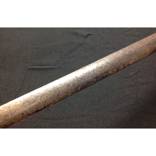 440 - Dress Sword with 77.5cm long double edged blade with etched decoration.  No makers mark. Brass guard... 