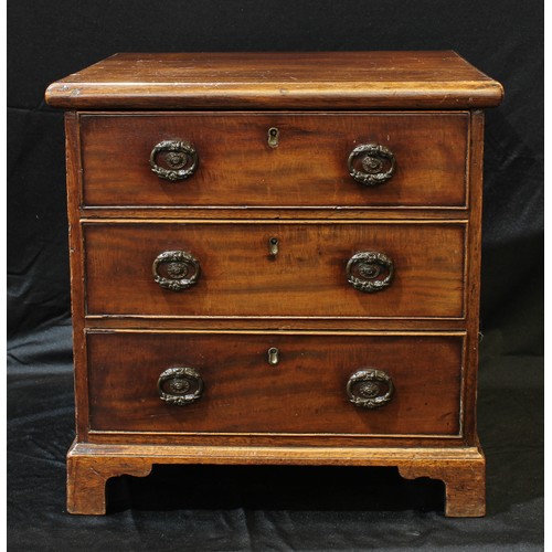 1520 - Miniature Furniture - a 19th century mahogany chest, slightly oversailing rectangular top above thre... 