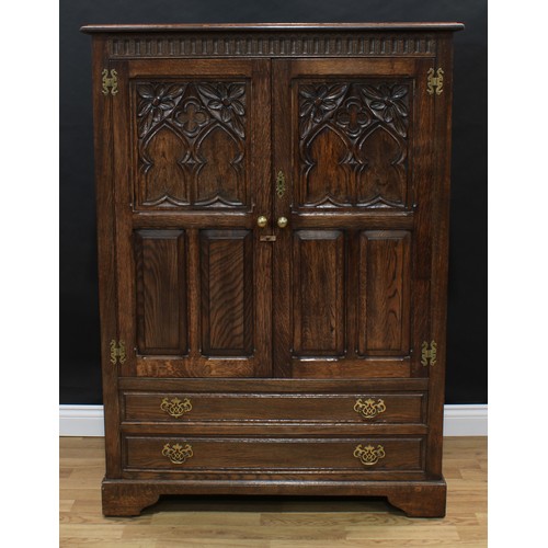 1504 - Frank Pratt of Derby - a 17th century style oak press cupboard or hall robe, rectangular top with mo... 