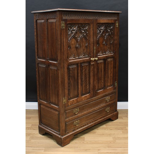 1504 - Frank Pratt of Derby - a 17th century style oak press cupboard or hall robe, rectangular top with mo... 