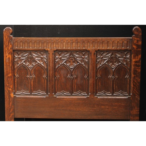 1512 - Frank Pratt of Derby - a pair of 17th century design oak beds, each headboard crested by a nulled fr... 