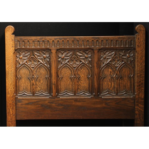 1512 - Frank Pratt of Derby - a pair of 17th century design oak beds, each headboard crested by a nulled fr... 