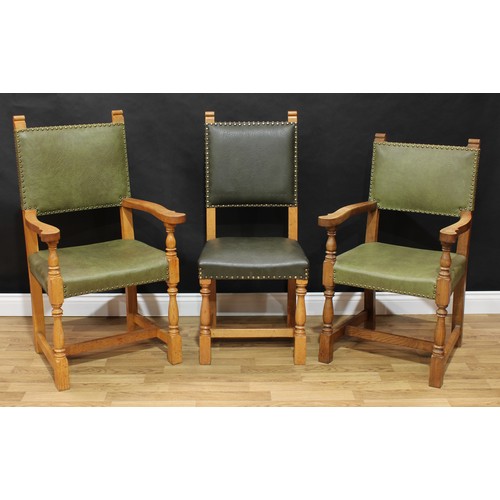 1509 - Frank Pratt of Derby - a composed set of three Arts & Crafts style oak chairs, comprising two open a... 