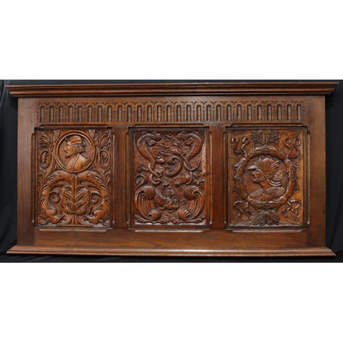 1507 - Frank Pratt of Derby - a 17th century style oak wall hanging panel, moulded pediment above a nulled ... 