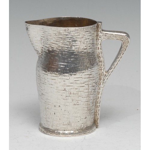 736 - An unusual Victorian silver pitcher cream jug, as a leather jack, gilt interior, 9.5cm high, Edward ... 