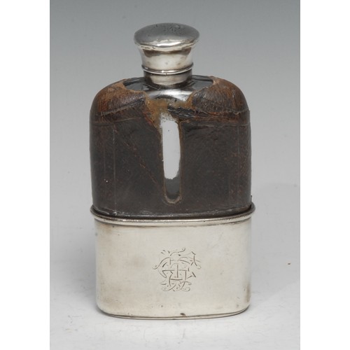 738 - Asprey - Victorian silver and clear glass hip flask, domed screw-fitting cover, stirrup cup to base,... 