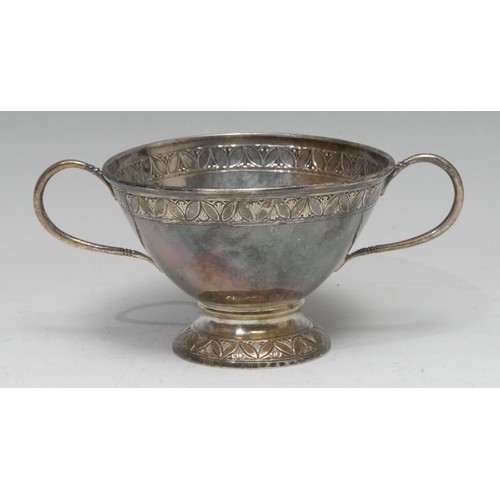 750 - Liberty & Co - an Arts and Crafts silver two-handled conical bowl, lightly planished and chased with... 