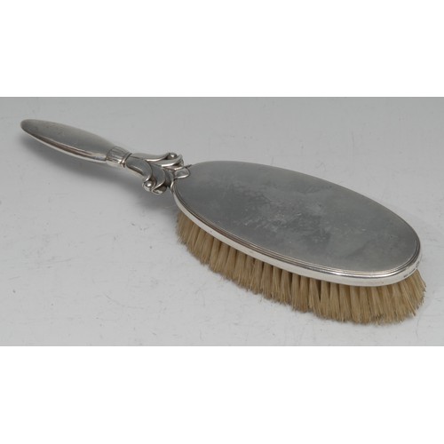 742 - Georg Jensen - a silver clothes brush, stylised lotus socle, 22.5cm long, import marks for London 19... 