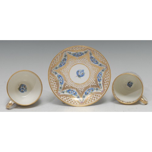 72 - A rare Derby coffee cup, teacup and saucer, in Sevres style,  painted in the manner of William Billi... 