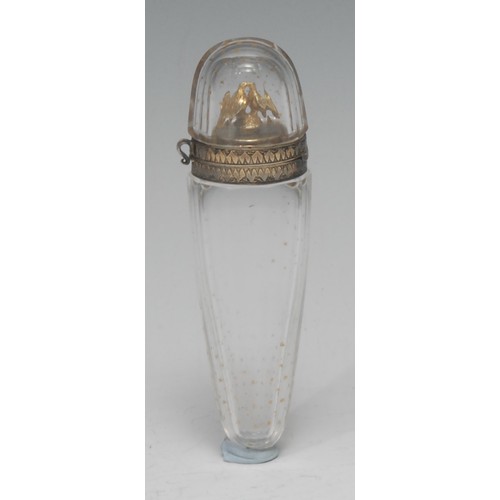 856 - An early 19th century French yellow metal-mounted glass tapering scent flask, the hinged cover enclo... 