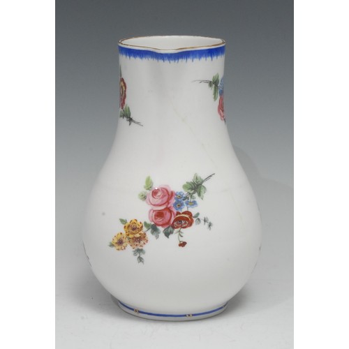 151 - A Sèvres water jug (pot à eau ordinaire), painted with pink and yellow roses, and further summer flo... 