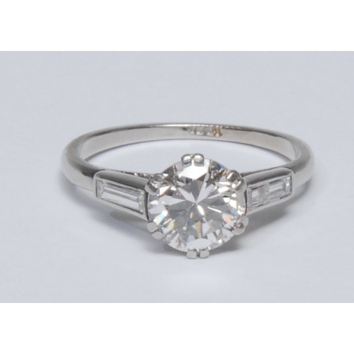 770A - A diamond solitaire ring, round brilliant cut diamond measuring approximately 6.79mm x 6.69mm x 4.33... 