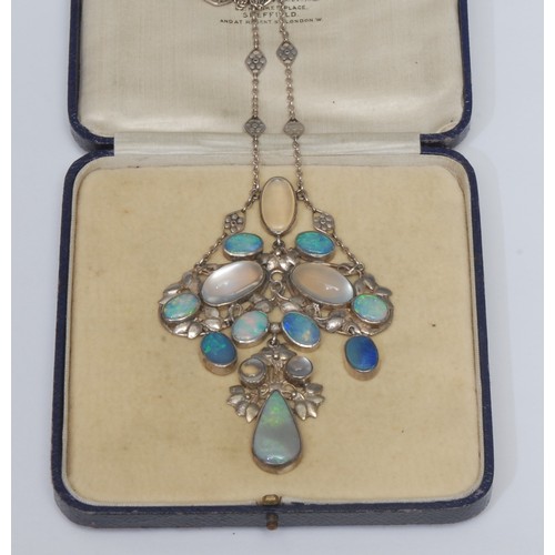 825 - An early 20th century hand crafted Arts and Crafts opal and moonstone pendant necklace, in the style... 